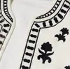 Chal de punto transfronterizo estilo europeo y americano 2026 nueva moda elegante Amazon venta al por mayor de ropa para mujer para ir al trabajo bordado abierto