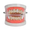 Explosiones transfronterizas tirantes de hip-hop de ocho dientes irregulares circonita microincrustada dientes disfraz de vampiro de Halloween adornos de dientes exagerados