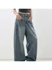 Jeans azules de estilo americano con dobladillo curvo para mujer, nuevo estilo primavera 2026, pantalones anchos holgados con un elegante diseño de corte banana de cintura alta