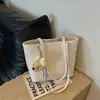 Bolso de mano de gran capacidad transfronterizo para mujer, nuevo modelo de verano 2026 versión coreana, bolso tote versátil para la escuela, bolso de hombro y para debajo del brazo