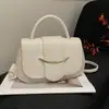 Popular bolso pequeño cuadrado texturizado estilo coreano, nueva tendencia de moda verano 2026, versátil y simple para llevar al hombro/cruzado/de mano