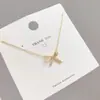 Collar de Nudo de Lazo de Verano Lujo Ligero Sentido de Diseño de Nicho 2026 Nuevo Estilo Cadena para Clavícula de Mujer Collar de Tacto de Gama Alta Joyería