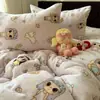 Juego de Cuatro Piezas de Terciopelo de Leche Cartoon Clase A Cálido de Invierno Acolchado con Terciopelo Extra Terciopelo de Coral Nuevo Juego de Sábana y Funda de Edredón de Tres Piezas