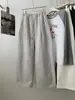 Calça casual de retalhos larga e curva para mulheres, versão coreana outono 2026, cintura alta afuniladora com cordão, perna reta, uso duplo
