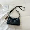 Bolsa de ombro/axila simples de cor sólida estilo coreano, nicho, para mulheres, novo modelo de verão 2026, bolsa transversal moderna para trabalho e deslocamento