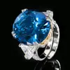 2024 nueva joyería Huabi cobre chapado en oro simulación corindón rojo cristal azul anillo retro 18*20 al por mayor