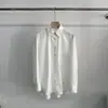 Camisa de Manga Larga Suelta con Estampado de Letras y Bolsillo Nueva Primavera 2025 Dongdaemun Coreano para Mujer Corte Holgado