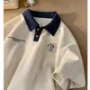 Nueva Camiseta Retro Americana para Hombre Verano 2026 Camiseta de Manga Corta con Cuello Polo para Pareja Top de Diseño Único Holgado