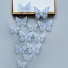 Decoración de mariposa de papel con simulación tridimensional 3D, accesorios de joyería de mariposa hueca tridimensional con textura metálica, pegatinas de pared para el hogar al por mayor