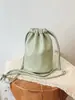 Bolsas Femininas Transfronteiriças 2026 Nova Versátil Casual Cordão Ombro Transversal Estilo Coreano Cordão Bolsa Balde para Celular
