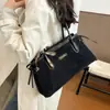 Bolso de hombro retro de gran capacidad estilo coreano transfronterizo para mujer, nuevo y moderno bolso tote de hombro para el día a día 2026