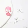 Uña Corazón de Dragón lazo incrustado cristal amor Diamante hermosa chica Corbata de lazo tridimensional resina uña pegar decoraciones de diamante