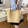 Bolsa Feminina Textura Trançada de Nicho 2026 Nova Retro Grande Capacidade Ombro Único de Alta Qualidade Versátil para o Dia a Dia Bolsa Tote