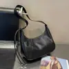 2026 Nuevo Modelo de Gama Alta Piel de Vaca de Primera Capa Bolso de Nicho en Forma de Media Luna Cuero Genuino para Hombro Versátil de Viaje Debajo del Brazo Cruzado Bolso para Mujer