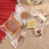 Bolsa de embalaje transparente con diseño de copos de nieve crujientes para pastel de luna, glaseada, para hornear galletas, turrón, bolsa de embalaje de alimentos, bolsa autosellada con máquina.