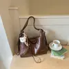 Bolsa Tote Grande Capacidade Transfronteiriça para Mulheres 2026 Verão Nova Moda para o Dia a Dia Bolsa de Ombro Estilosa Tendência Mochila Casual
