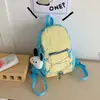 Mochila infantil de color block estilo coreano, moderna y versátil, diseño simple para niños y niñas, adecuada para preescolar y viajes, mochila pequeña ligera