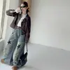 Conjunto de chaqueta de cuero para niñas otoño e invierno 2026 casual estilo coreano para niñas mayores chaqueta de cuero encerado y conjunto de jeans
