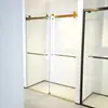 Ventas directas del fabricante: cabina de ducha con puerta doble corredera sin marco, mampara de cristal lineal para proyectos de hotel y casa de huéspedes