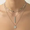 Acessórios mais vendidos na Amazon de comércio eletrônico transfronteiriço Moda criativa europeia e americana colar multicamadas pingente redondo corrente para suéter feminino