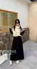 Falda Midi Casual Recta de Moda con Abertura de Nicho para Mujer Otoño 2025 Nueva Moda Cintura Elástica Falda con Cordón