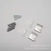Los fabricantes suministran accesorios para marcos de plástico para el hogar, clips para espejos de acero inoxidable, soportes para espejos, espejos colgantes con una variedad de opciones