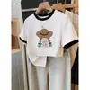 Camiseta de Manga Curta em Algodão Puro com Blocos de Cor e Ombros Retos para Mulheres, Design Único, Fashion, Versátil, Top Emagrecedor, Verão 2026