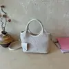 Bolso de Cubo Tejido Retro Francés 2026 Nuevo Estilo Grande para Viajes Diarios Bolso Bandolera Bolso Cesta de Verduras Lujo Accesible Moda Bolso de Mujer
