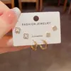 Set de pendientes de aro estilo francés minimalista con flor de cuatro hojas de circón, exquisito, moderno, compacto, versátil para el uso diario, con sentido de diseño