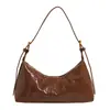 Bolsa Versátil para Axila Estilo Francês para Mulheres Verão 2025 Nicho Retro Simples Cor Sólida Bolsa de Ombro Transversal para o Dia a Dia