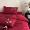 Conjunto de Roupa de Cama para Casamento Chinês de Quatro Peças Algodão Jacquard Bordado de Fio Longo 50s Dupla Face Festivo para Casa Nova Roupa de Cama Vermelha