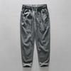 Calça casual reta de cintura elástica nova e fresca de verão para homens, de algodão e linho, solta, versátil
