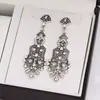 Nuevos Pendientes Transfronterizos Europeos y Americanos, Pendientes de Alta Gama Incrustados con Diamantes para Mujer, Pendientes Largos Exagerados y Únicos en Forma de Gota de Agua, En Stock