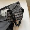 Bolsa Xadrez Tendência de Outono e Inverno Nicho para Mulheres 2026 Novo Estilo Versátil Bolsa Transversal Bolsa de Ombro Plissada para Sobraco