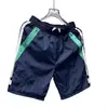 Shorts casuales de verano para hombres y mujeres, marca de moda ins holgados casuales de moda pantalones de longitud media, pantalones versátiles de estilo coreano de cinco puntos