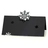 Tarjeta de asiento hueca navideña exclusiva para exportar, tarjeta de mesa hermosa, tarjeta de nombre y asiento, copo de nieve blanco en stock