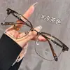 Nuevos armazones para anteojos estilo retro para hombres y mujeres, modernos y a la moda, diseño de media montura, bloqueo de luz azul, micas transparentes, listos para usar y con una estética china