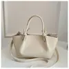 Bolso cruzado de alta gama para mujer de nicho transfronterizo, modelo nuevo 2026, bolso cruzado simple y versátil para el día a día, bolso de mano tipo cubo a la moda