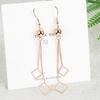 Pendientes de gancho para la oreja chapados en plata con borde cruzado, sencillos pendientes de borla de longitud media exagerada con forma de estrella de cinco puntas, bonitos y distintivos.