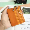 Nuevo Monedero Pequeño Coreano Monedero de Monedas Bolsillo Bolso Pequeño Bolso de Mano para Hombres y Mujeres Bolsa con Cremallera