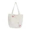Bolso pequeño floral de nuevo estilo 2026 para mujer, adecuado para el uso diario y la escuela, bolso tote con lazo y diseño de lunares, bolso de hombro
