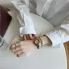 Viento frío reloj pequeño de azúcar temperamento diseño de alto nivel ins tamaño pequeño pequeño reloj de lujo ligero para mujer venta al por mayor