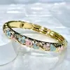 Nuevo brazalete de cloisonné esmaltado calado estilo chino, diseño colorido de goteo de aceite, brazalete tradicional chino para mujer, disponible para venta al por mayor desde la fábrica de origen