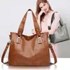 Bolso Tote Versátil de Moda Transfronterizo 2025 Nuevo Bolso de Hombro para Mujer Piel Suave de PU Retro Portátil para Viajes y Uso Diario Bolso de Axila