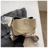 Bolso cubo popular transfronterizo 2026 nuevo estilo moderno de moda bolso de mano textura simple elegante versátil bolso de hombro único bandolera
