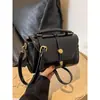 Nuevo bolso de mano para mujer 2026, moderno y de alta gama, moda nicho, bolso versátil de hombro y cruzado, popular bolso cuadrado pequeño
