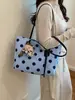 Bolsa de lunares de gran capacidad de verano 2026 Bolso de hombro moderno y versátil Bolso tote para el trabajo de mujer Bolsa de mujer al por mayor