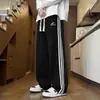 Pantalones deportivos holgados de moda para hombre, pantalones grises de pierna ancha retro americano de otoño, pantalones casuales fluidos para jóvenes