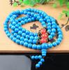 Fábrica Turquesa Turquesa del Tíbet Adornos del Tíbet Pulsera de 108 Cuentas de Buda Bucle de Cuentas de Buda de Turquesa Cabeza de Cera de Abeja