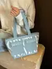 Bolso de lona con estampado de letras y múltiples bolsillos, modelo nuevo 2026, bolso de mano de alta gama, bolsa de compras, bolso de hombro, bolso de mano para el día a día